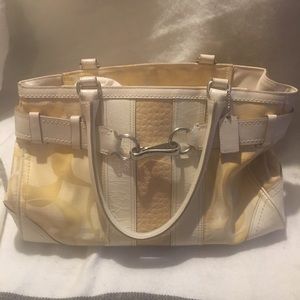 Gently used yellow coach bag.